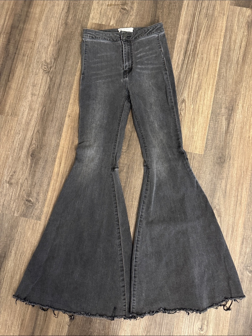 Free People Washed Black Wide-Leg Flare Jeans with Raw Hem